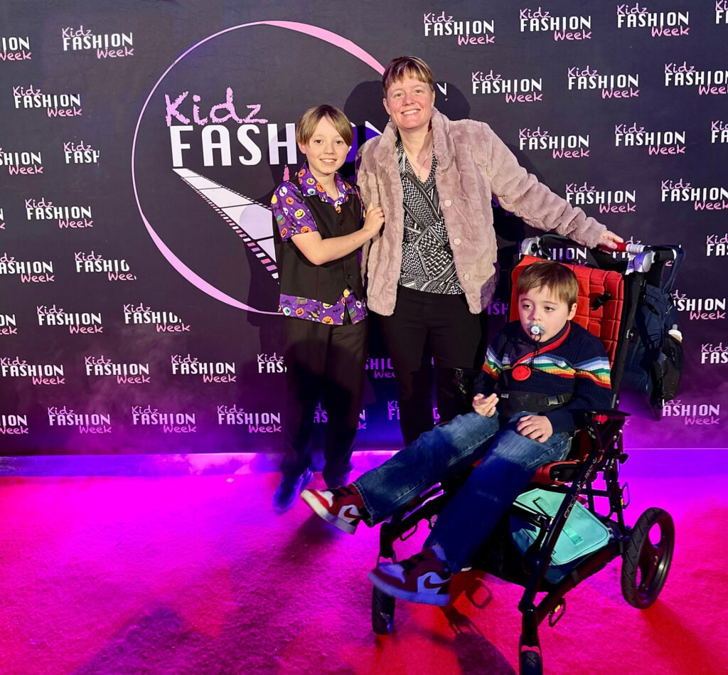 Ashton Nowers with mum and brother at Kids Fashion Week Gets Spooky